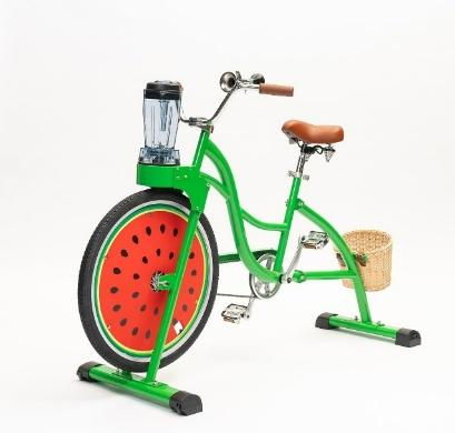 Green bicycle with basket for smoothie making